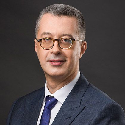 Marian DInu Managing Partner DLA Piper